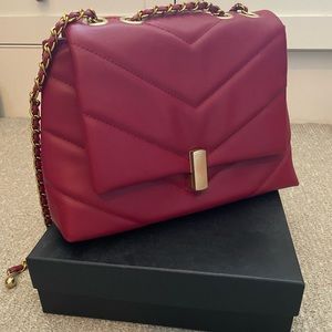 Beautiful red vegan leather bag.